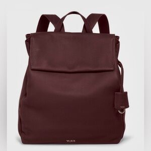 Like new TUMI leather backpack in deep plum - fits your daily essentials.
